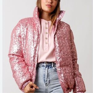 Pink sequin puffer jacket- size Small in women’s. Reversible foil pink